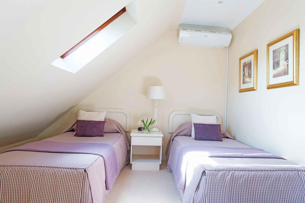Knightsbury Guest House เคปทาวน์ ห้อง รูปภาพ